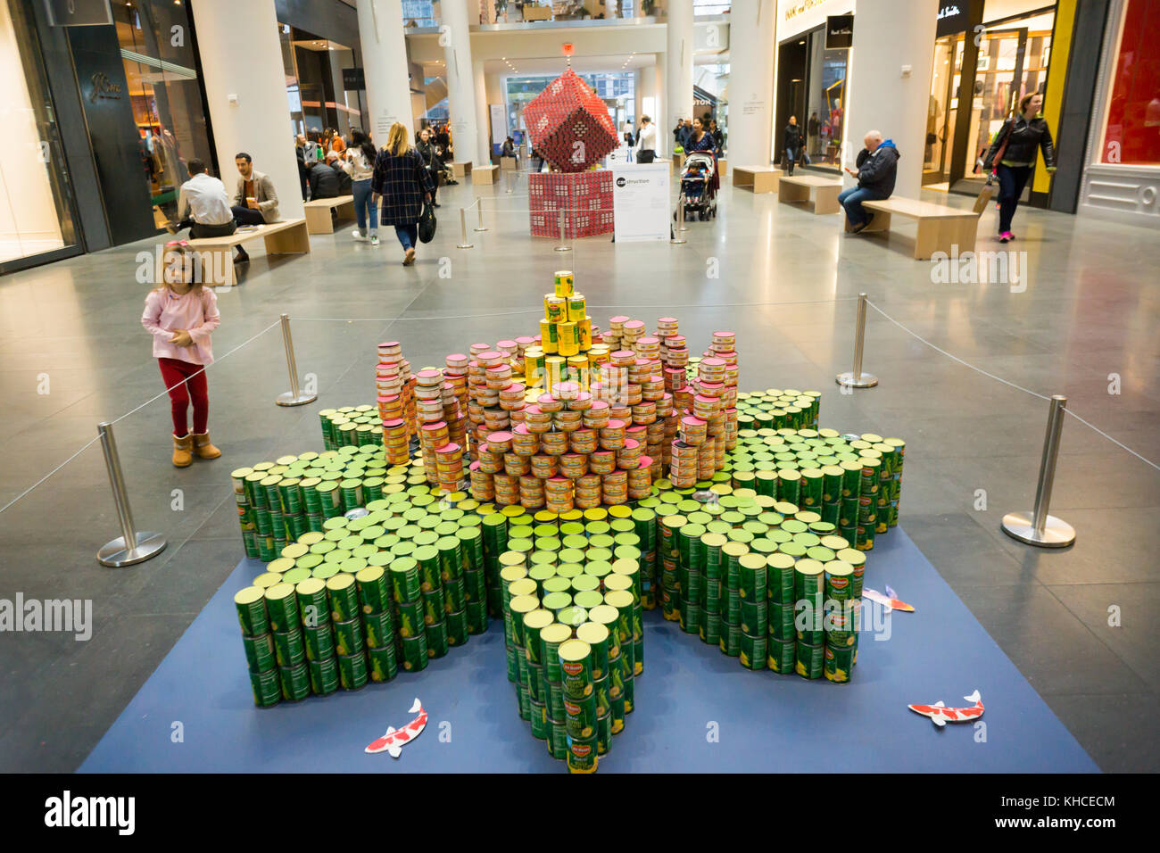 May Kindness Bloom by AKF Engineers in the 25th annual Canstruction Design Competition in New York, seen on Tuesday, November 7, 2017, on display in Brookfield Place in New York. Architecture and design firm participate to design and build giant structures made from cans of food.  The cans are donated to City Harvest at the close of the exhibit. Over 100,000 cans of food are collected and will be used to feed the needy at 500 soup kitchens and food pantries. (© Richard B. Levine) Stock Photo