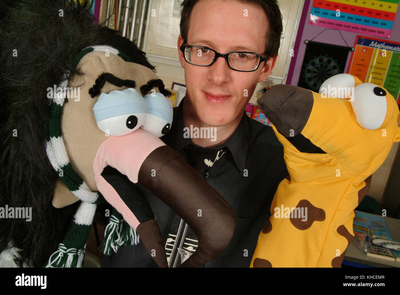 Teacher David Millington uses puppets, Gerald the Giraffe and Vinny the ...