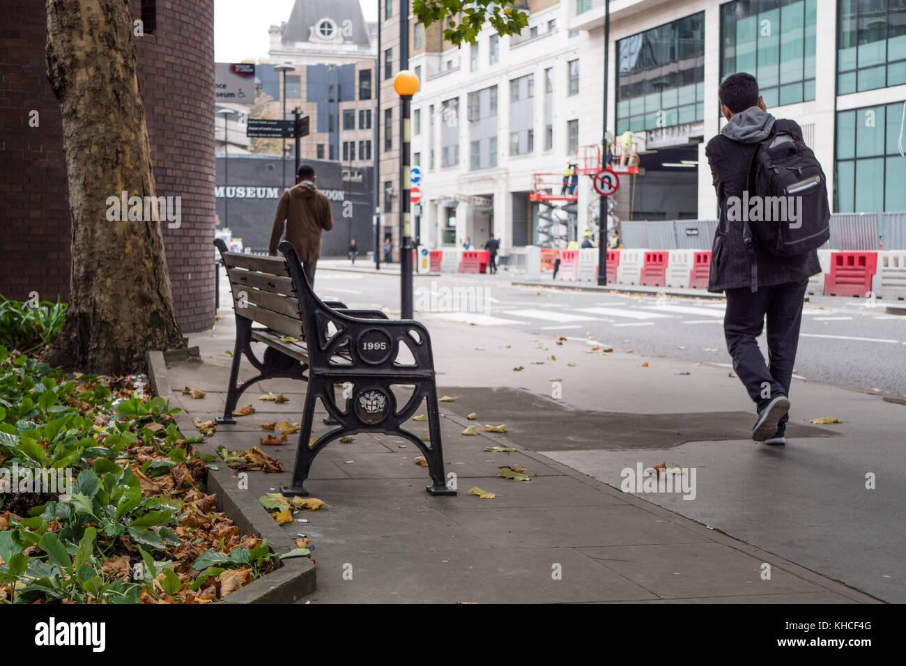 Plants, tree and a bench amongst the city. Near the Museum of London. Stock Photo