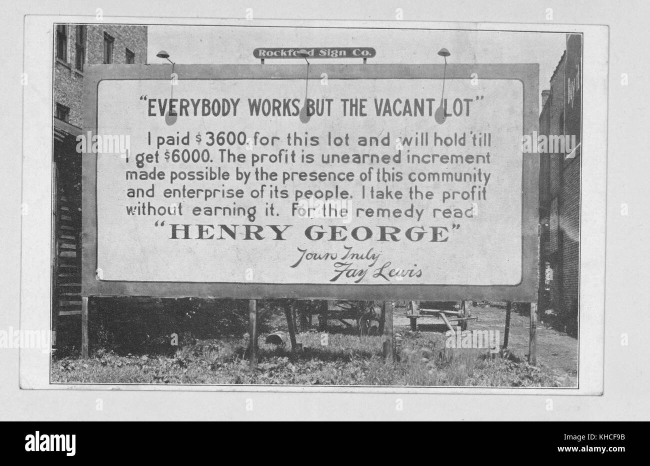 A photograph of a sign that features a quote from Henry George, who was a political economist and philosopher, the sign promoted his literature by pointing out what he saw as one of the problems with the American economy, 1900. From the New York Public Library. Stock Photo