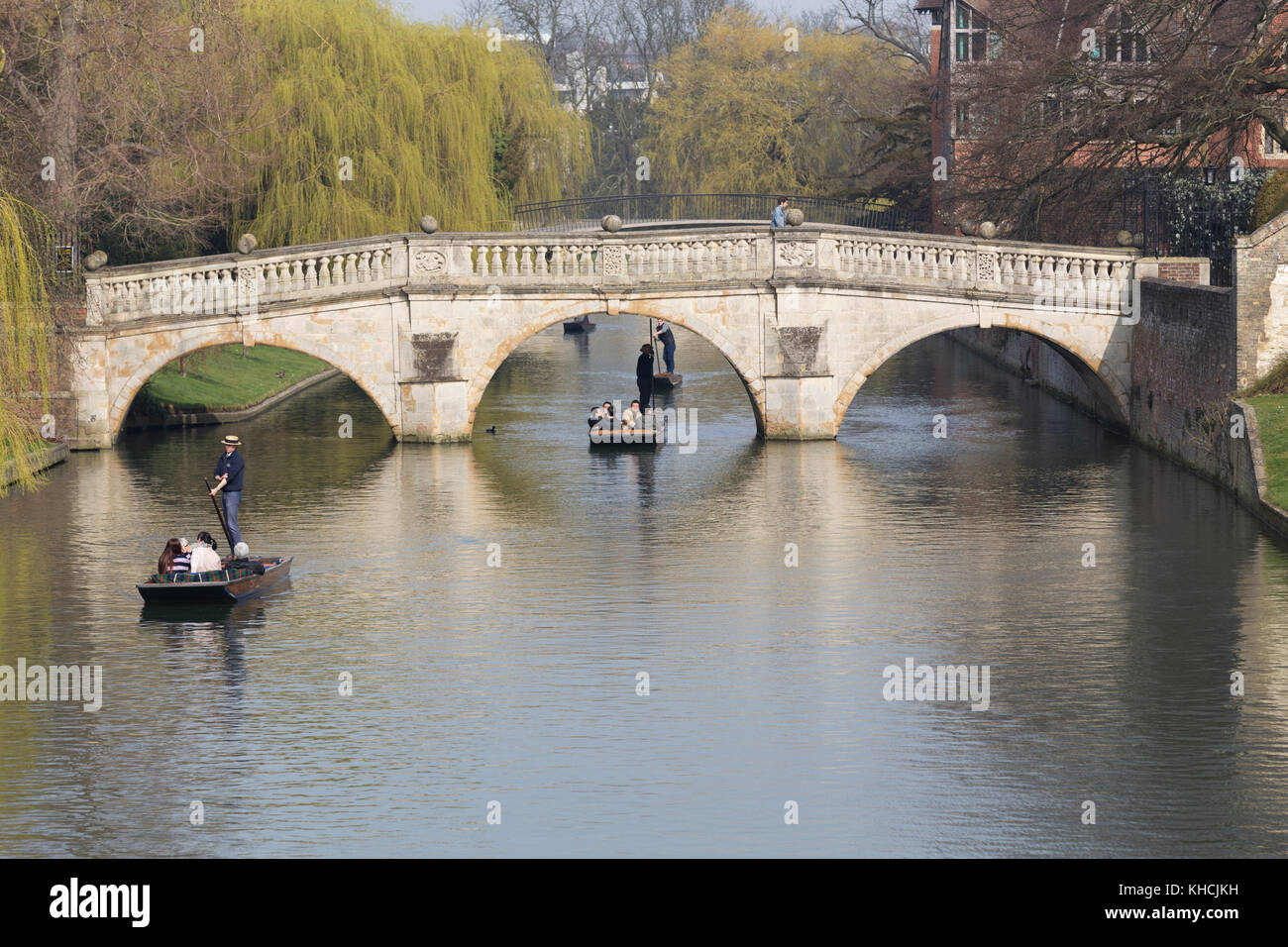 UK, Cambridge, punting along the river Cam under the Clare bridge. Stock Photo