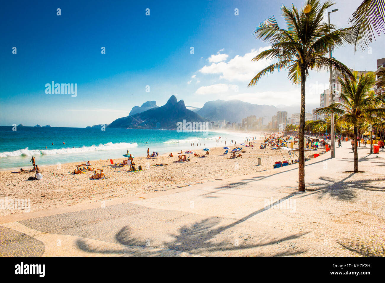 Palms and Two Brothers Mountain on Ipanema beach in Rio de Janeiro. Brazil. Stock Photo