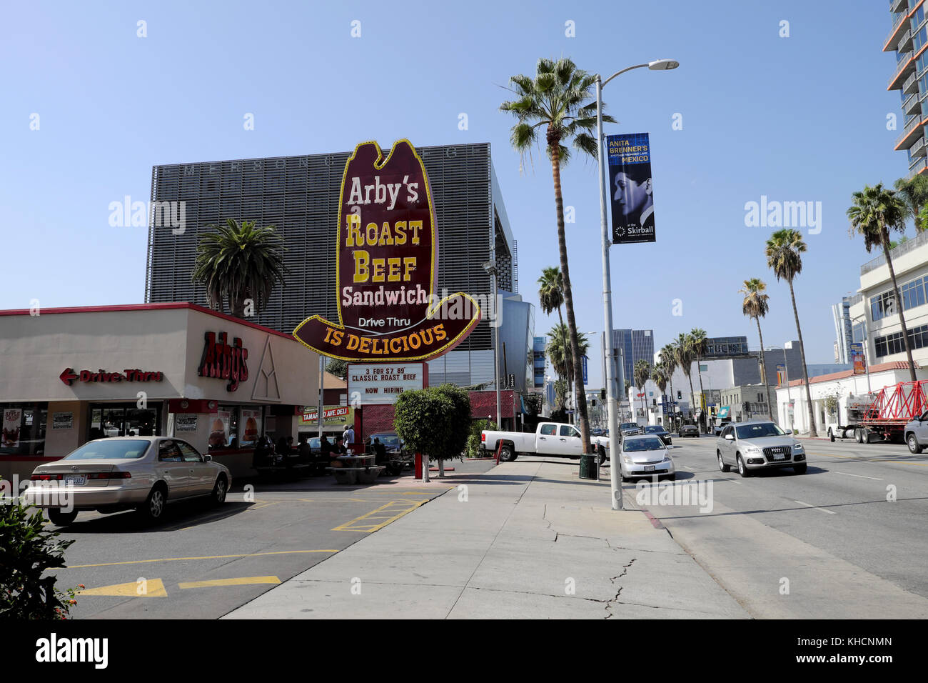 Arby's Roast Beef Sandwich Drive Thru fast food restaurant cowboy hat neon sign on Sunset Boulevard Los Angeles, California USA   KATHY DEWITT Stock Photo