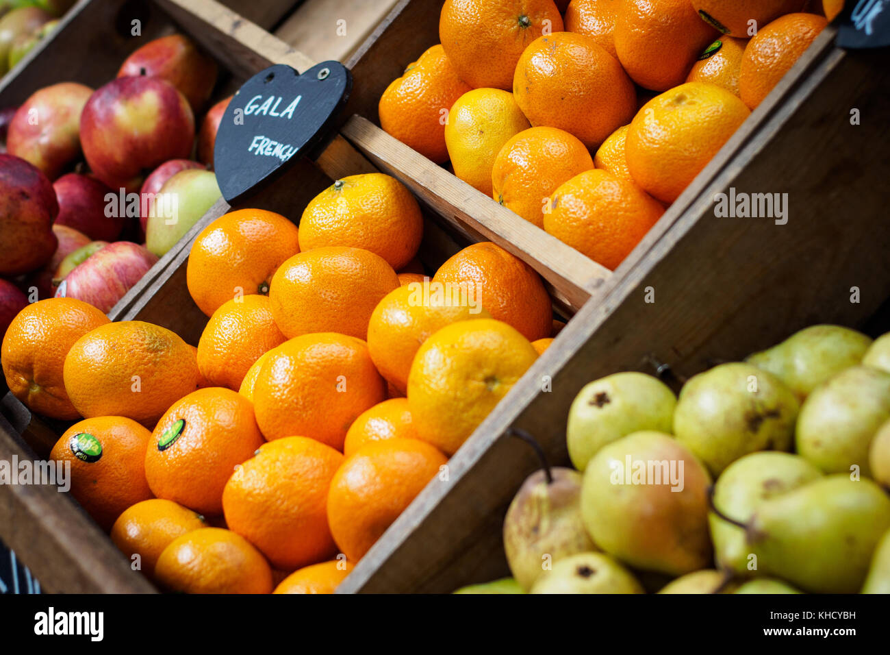 Fruit stall with apples and oranges in Borough Market (London