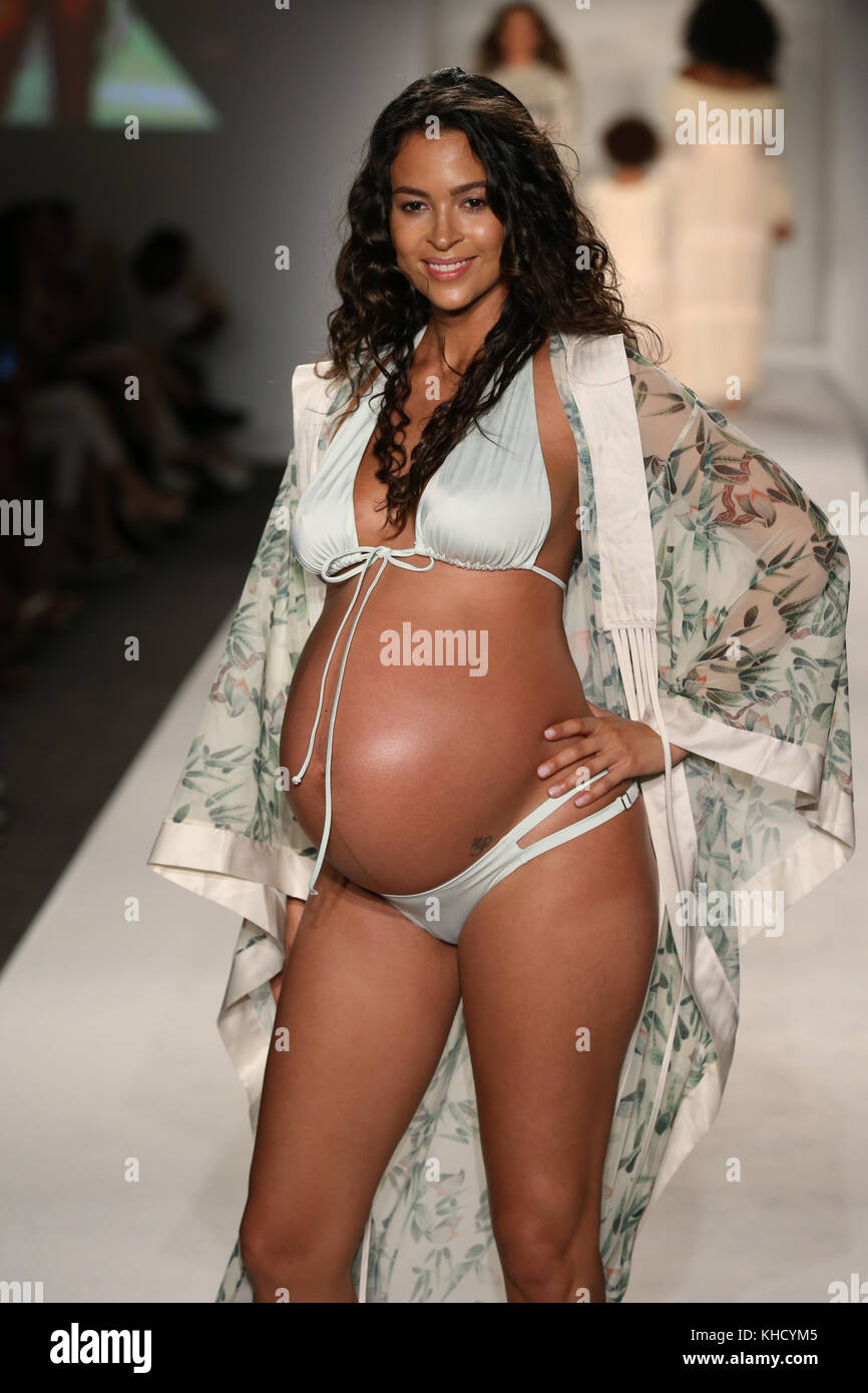 MIAMI BEACH, FL - JULY 21: A model walks the runway at the SWIMMIAMI Hot-As-Hell  2018 Collection fashion show at 227 22nd Street on July 21, 2017 in Miami  Beach, Florida. People: