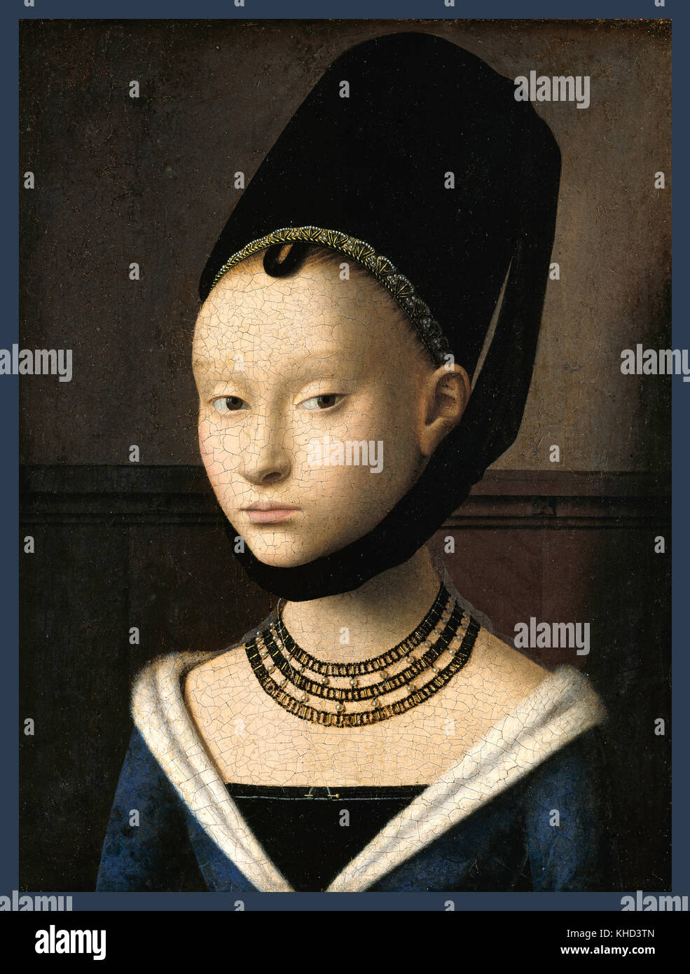 Portrait of a Young Girl a small oil-on-oak panel painting by Petrus Christus 1466 a major stylistic advance in contemporary portraiture; the girl is set in an airy, three-dimensional, realistic setting, and stares out at the viewer with an enigmatic expression that is reserved, yet intelligent and alert. Stock Photo
