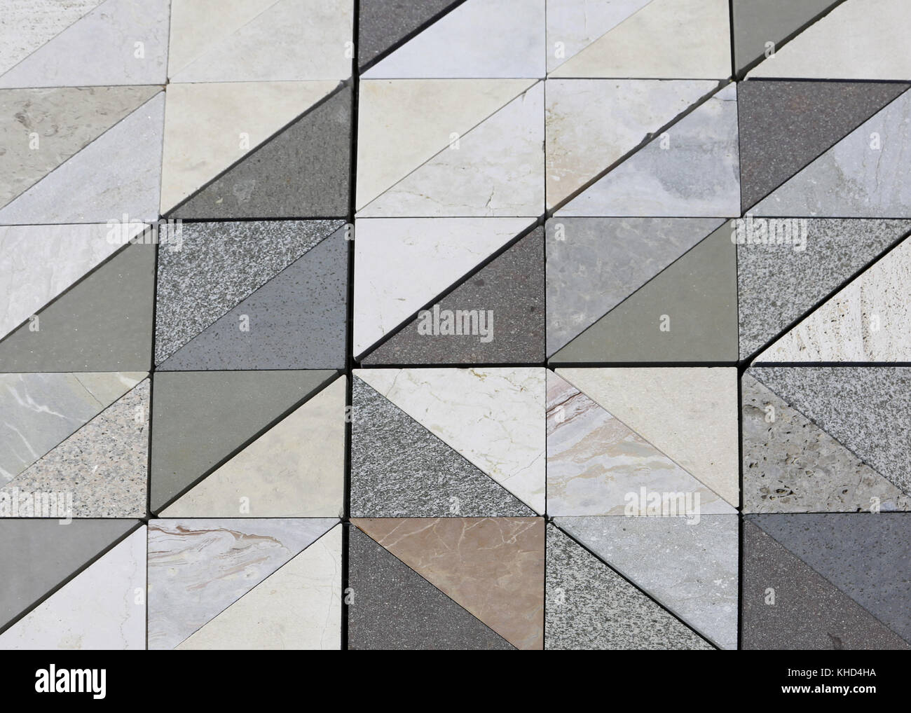 background of triangular marble stones each made with a different type
