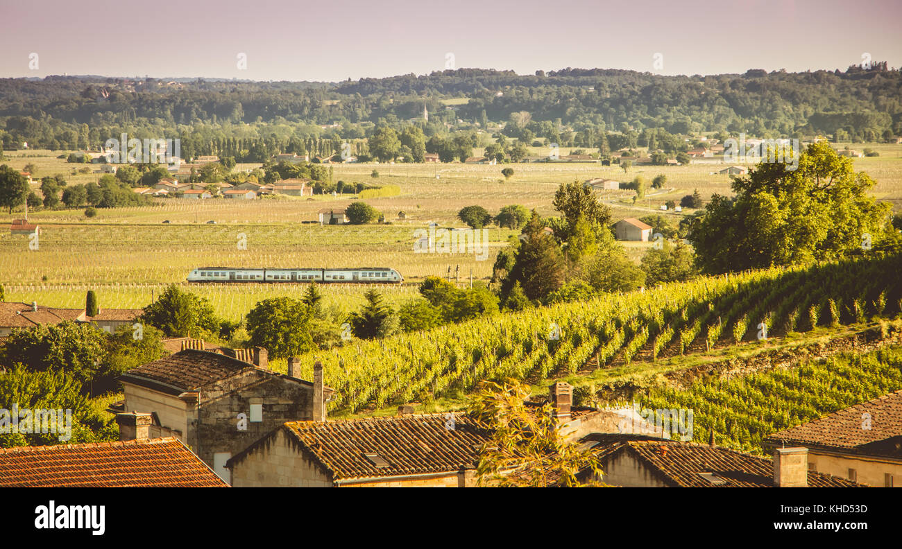 train passes in the valley of Saint Emilion, a French town very known for the manufacture of fine wines Stock Photo