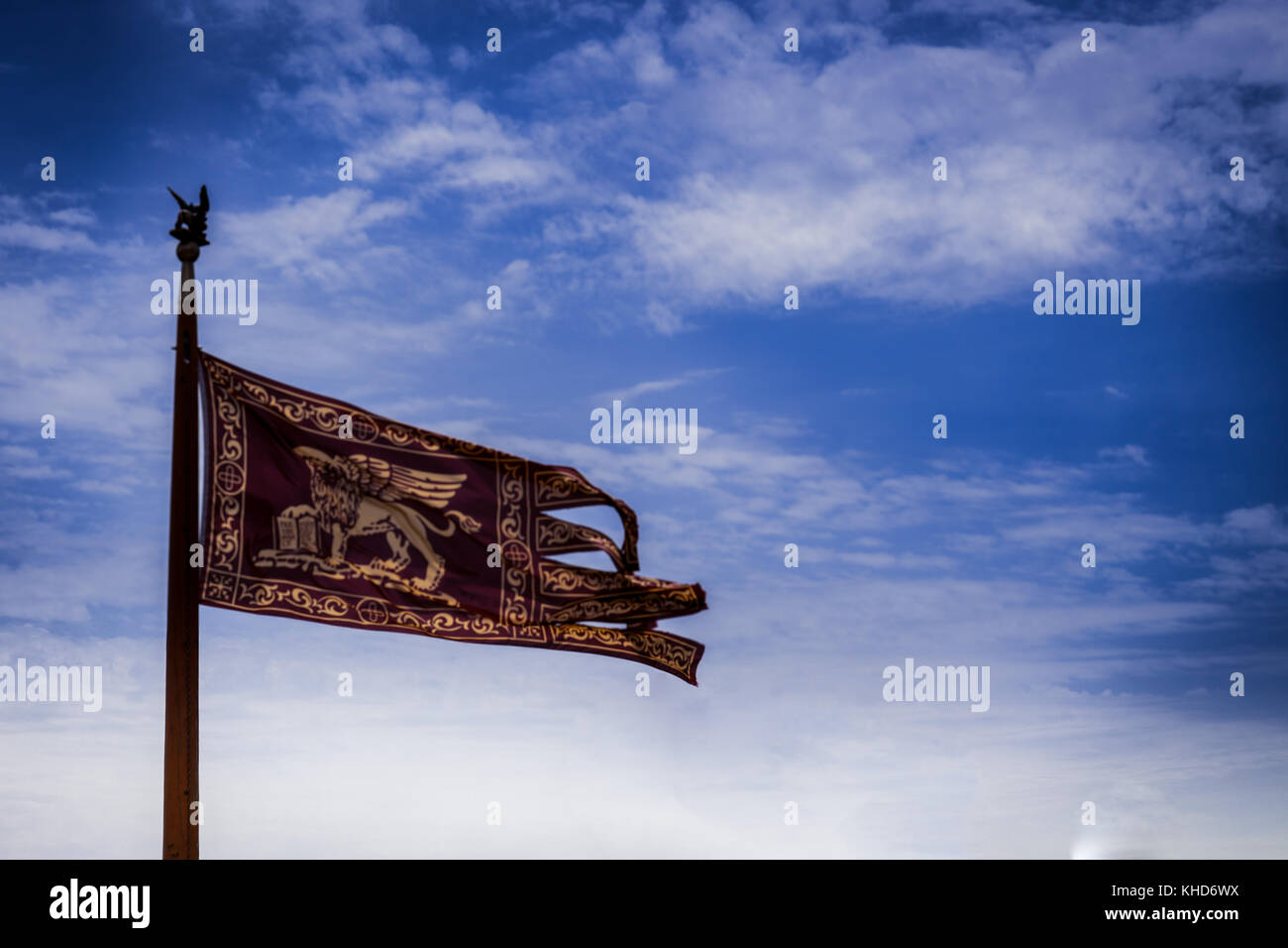 Flag of Venice, main symbol of Venice - the golden winged lion of Evangelist Mark Stock Photo