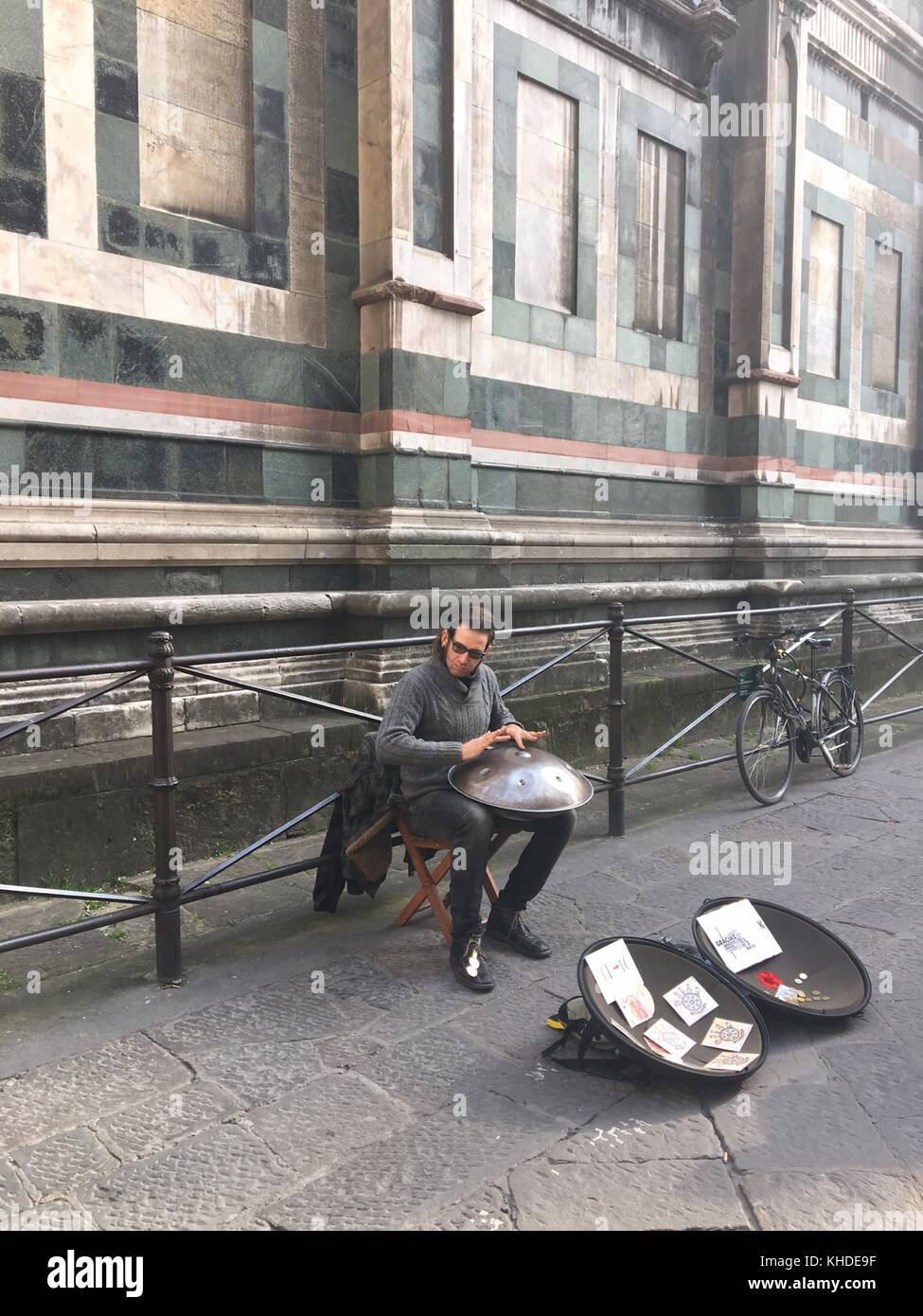 Busker playing an instrument near the Cathedral - Florence, Italy Stock ...