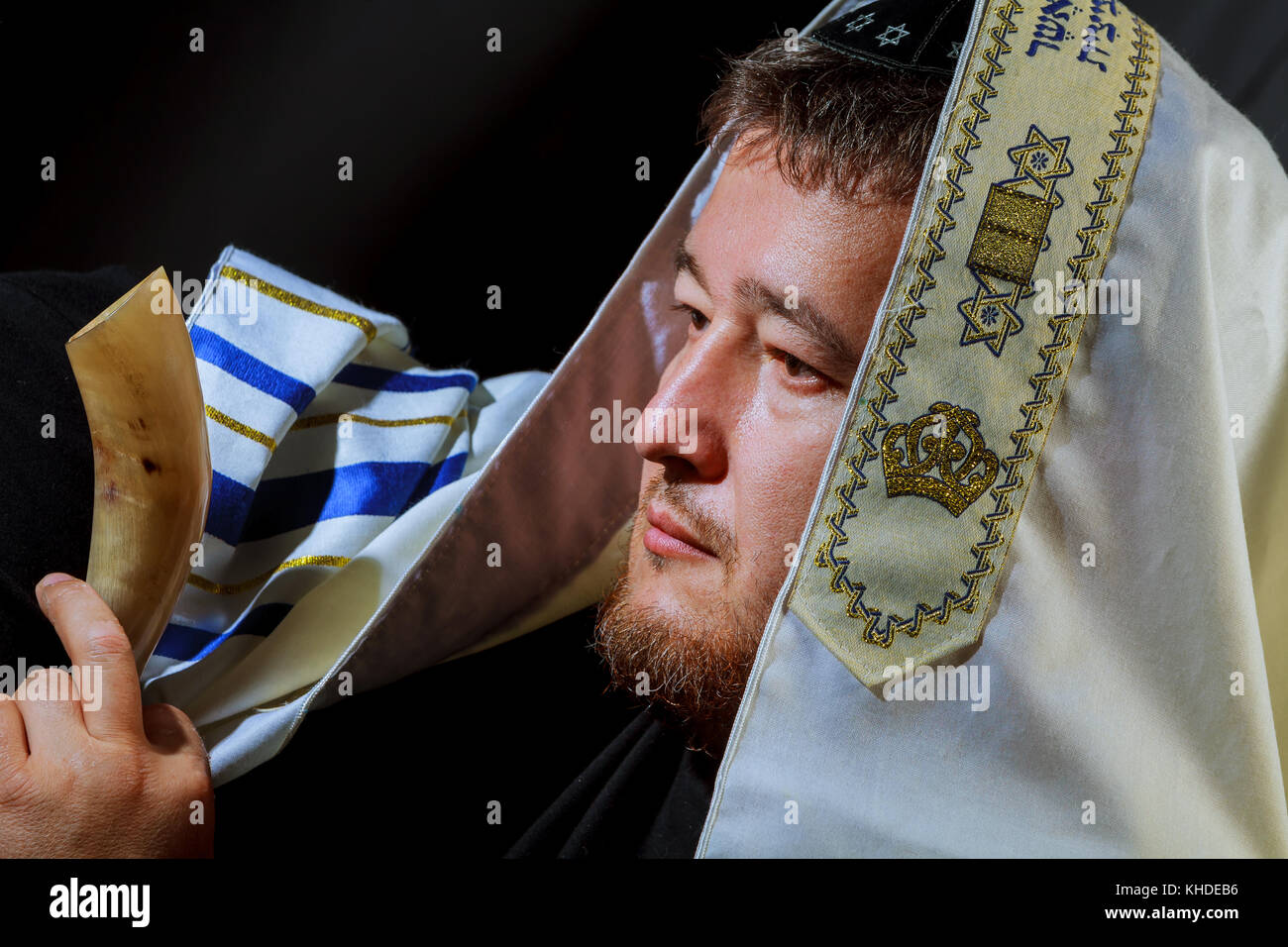 Jewish man blowing the Shofar horn of Rosh Hashanah New Year . Religious symbol Stock Photo Alamy