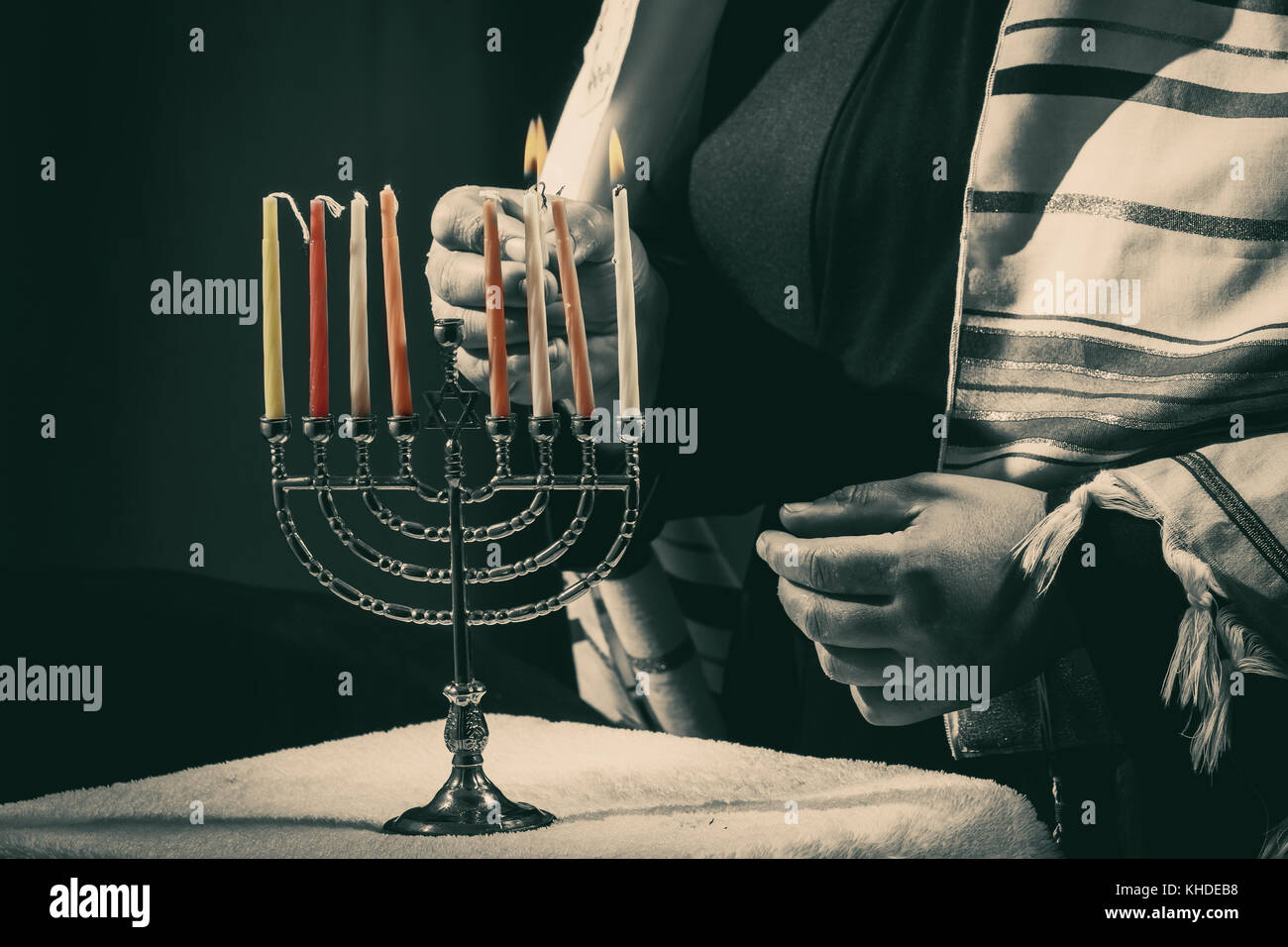 Lighting Menoral Candles on Jewish candle lights Stock Photo Alamy