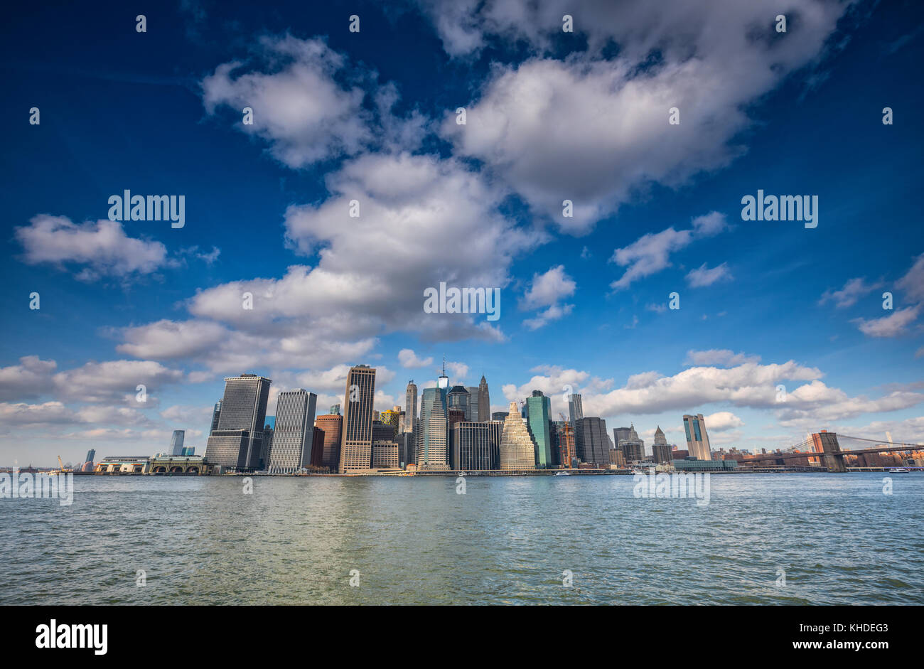 White clouds above Downtown Manhattan in New York City Stock Photo