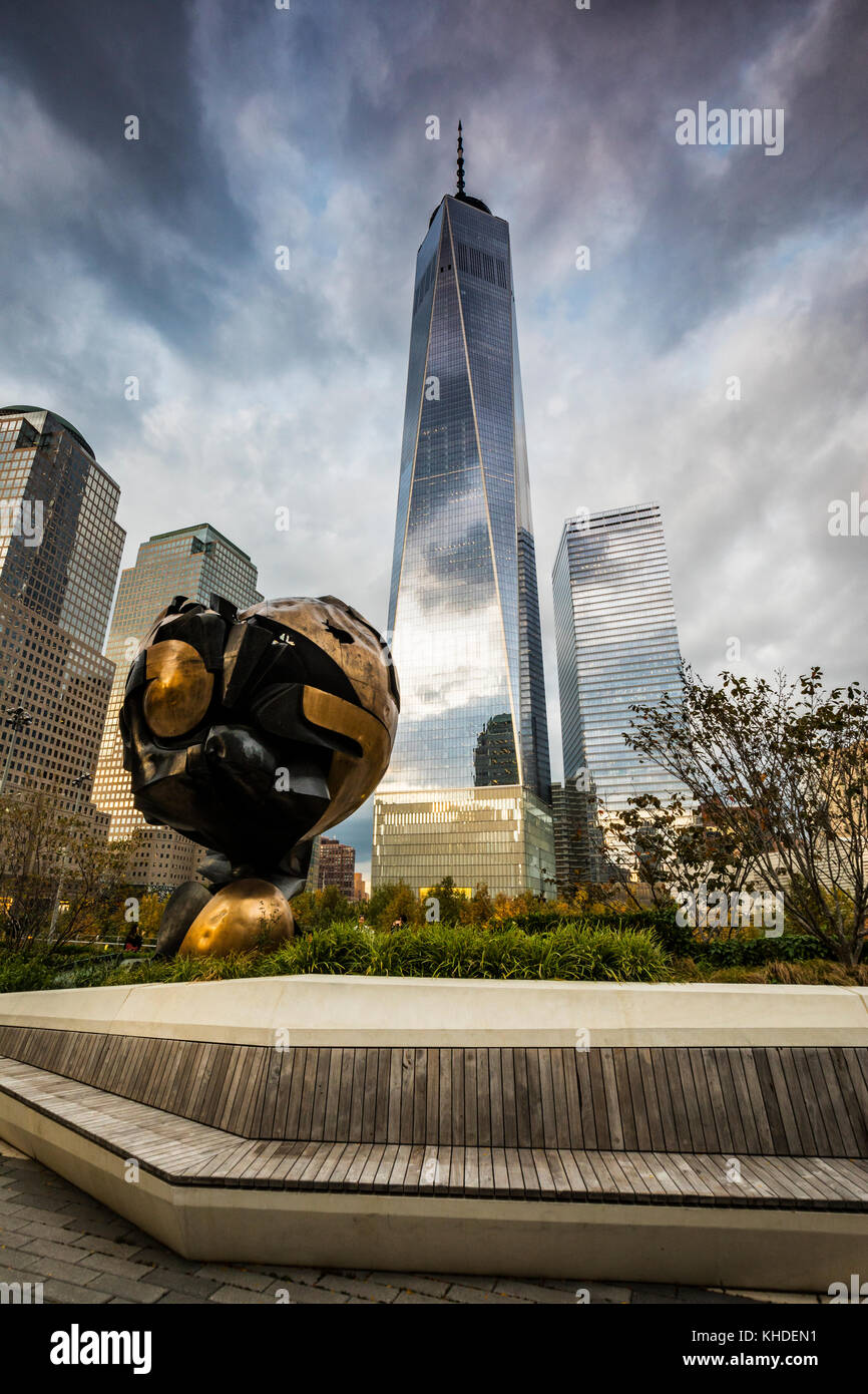 The Sphere in Liberty Park and Freedom tower on the back in New york City Stock Photo