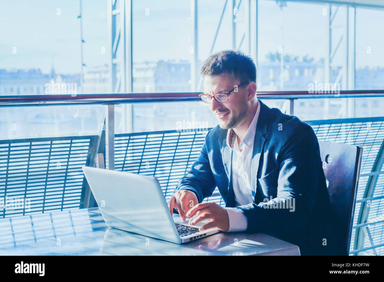 business man entrepreneur working on computer, businessman reading emails and smiling Stock Photo