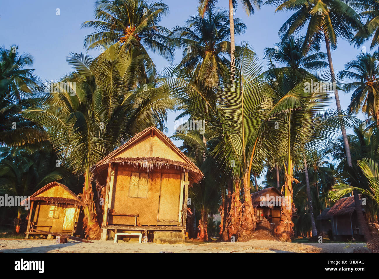 cheap budget accommodation on the beach, bamboo huts hotel Stock Photo