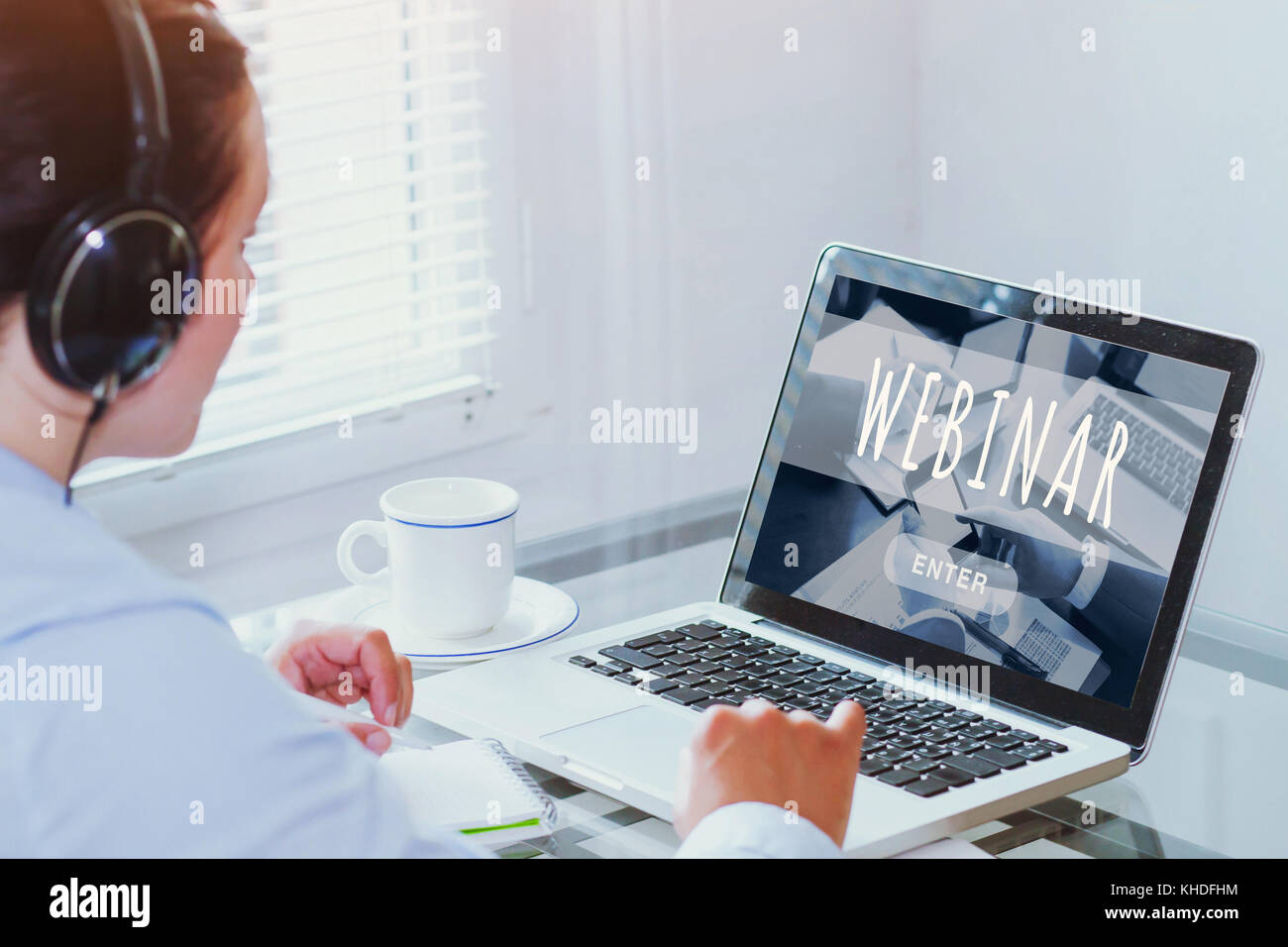 woman watching webinar online on computer, business education concept, coaching Stock Photo