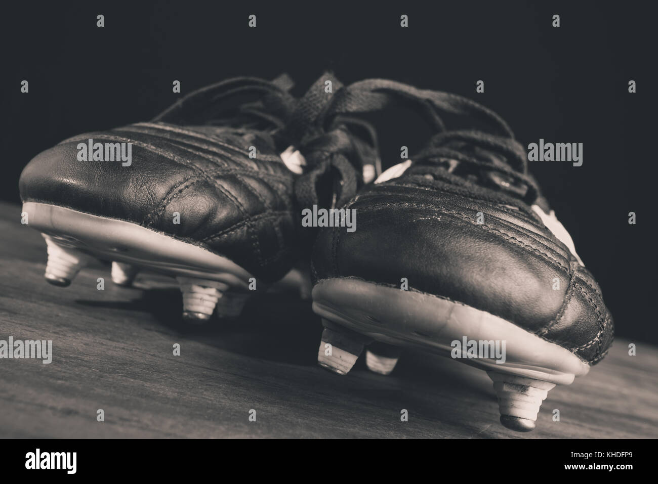 vintage soccer shoes - black and white photo Stock Photo - Alamy