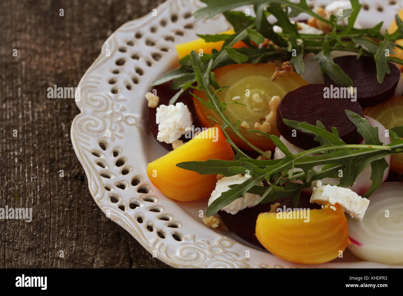 Healthy Beet Salad with red, white, golden beets, arugula, nuts, feta