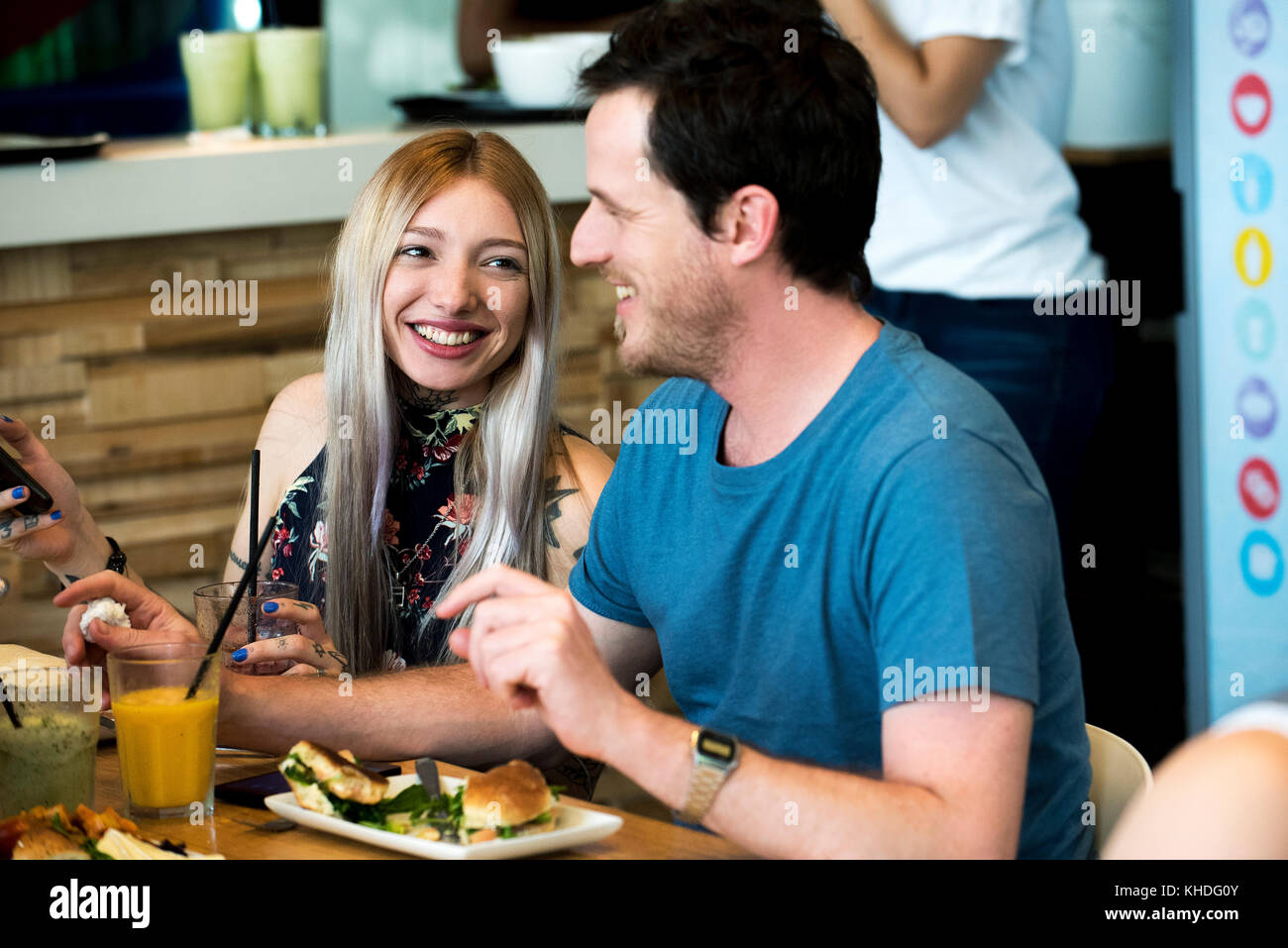 Friends having meal together at restaurant Stock Photo