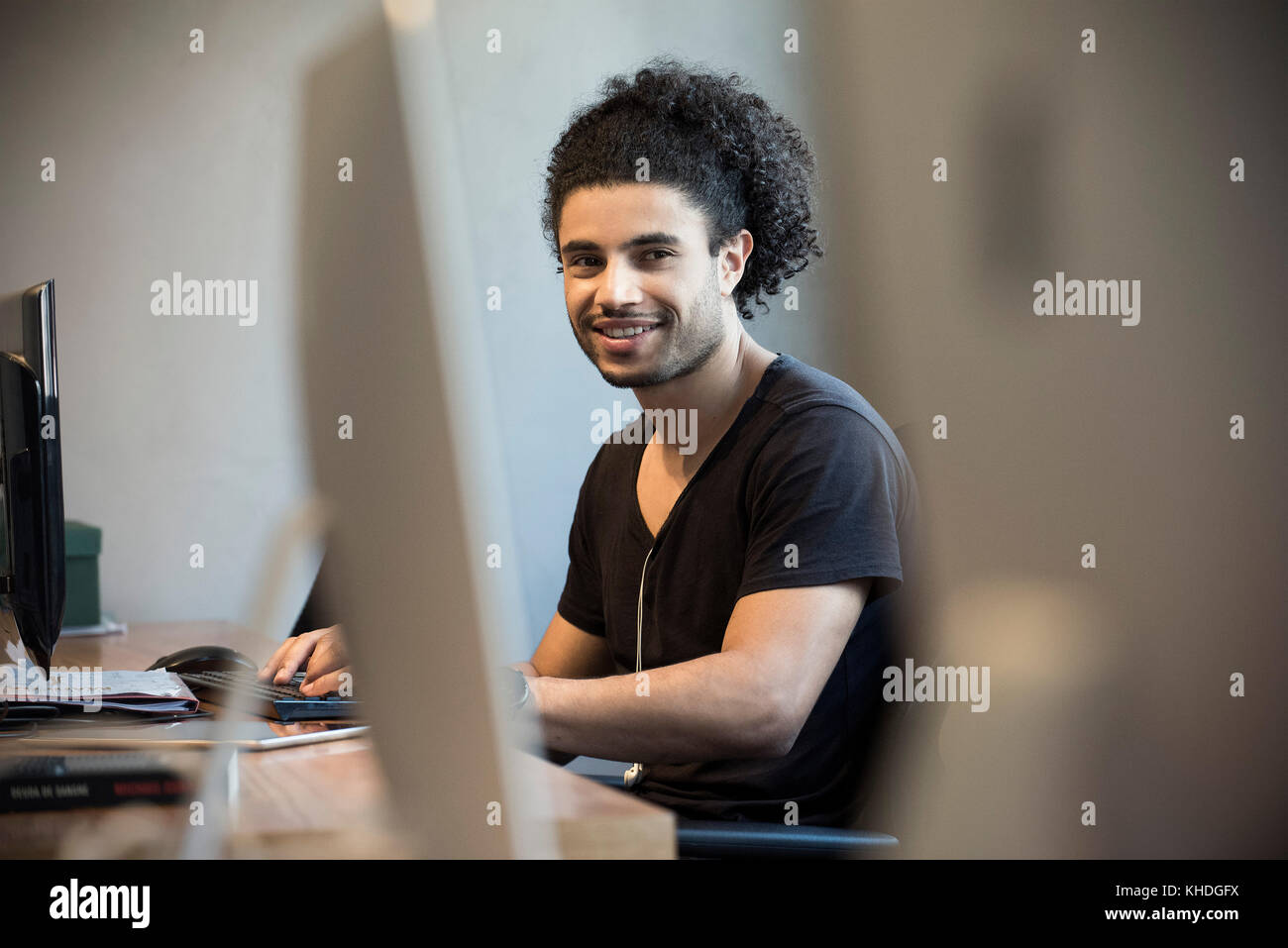 Man working in office Stock Photo - Alamy
