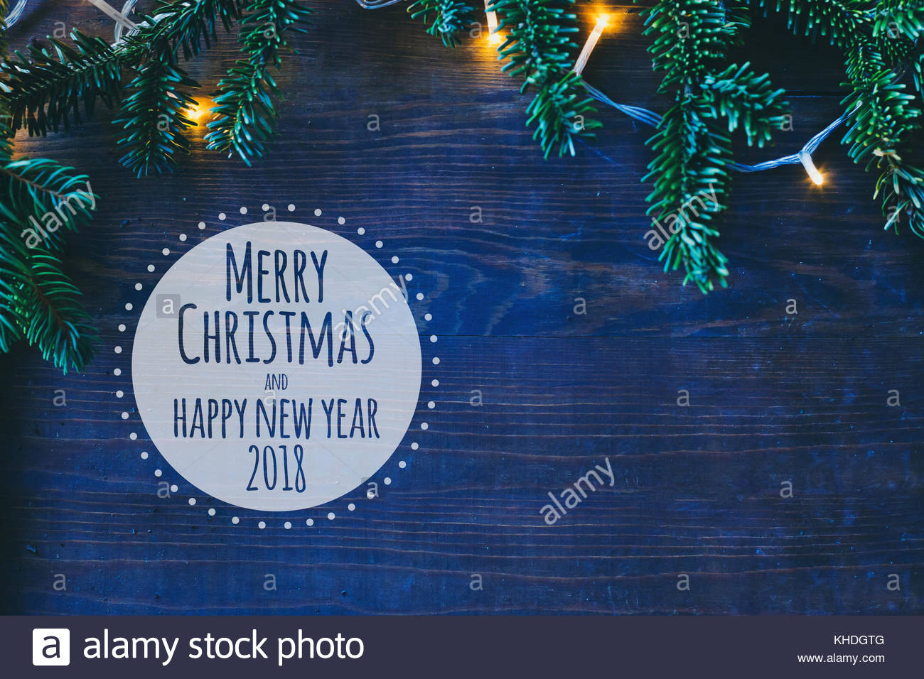 Merry Christmas and Happy New Year 2018 greeting card with copy space and blue tone