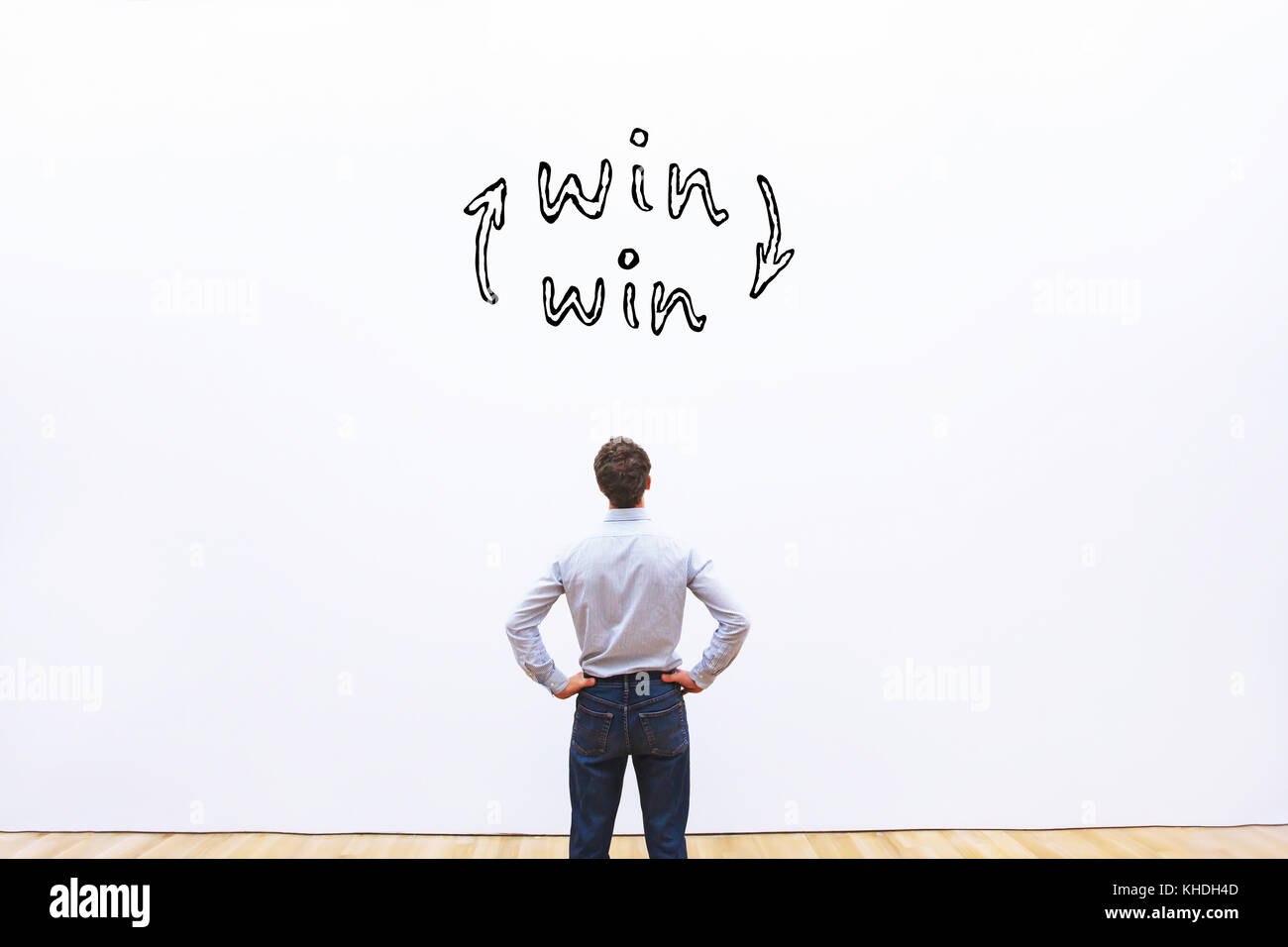 win-win concept, business man looking at win situation sign Stock Photo