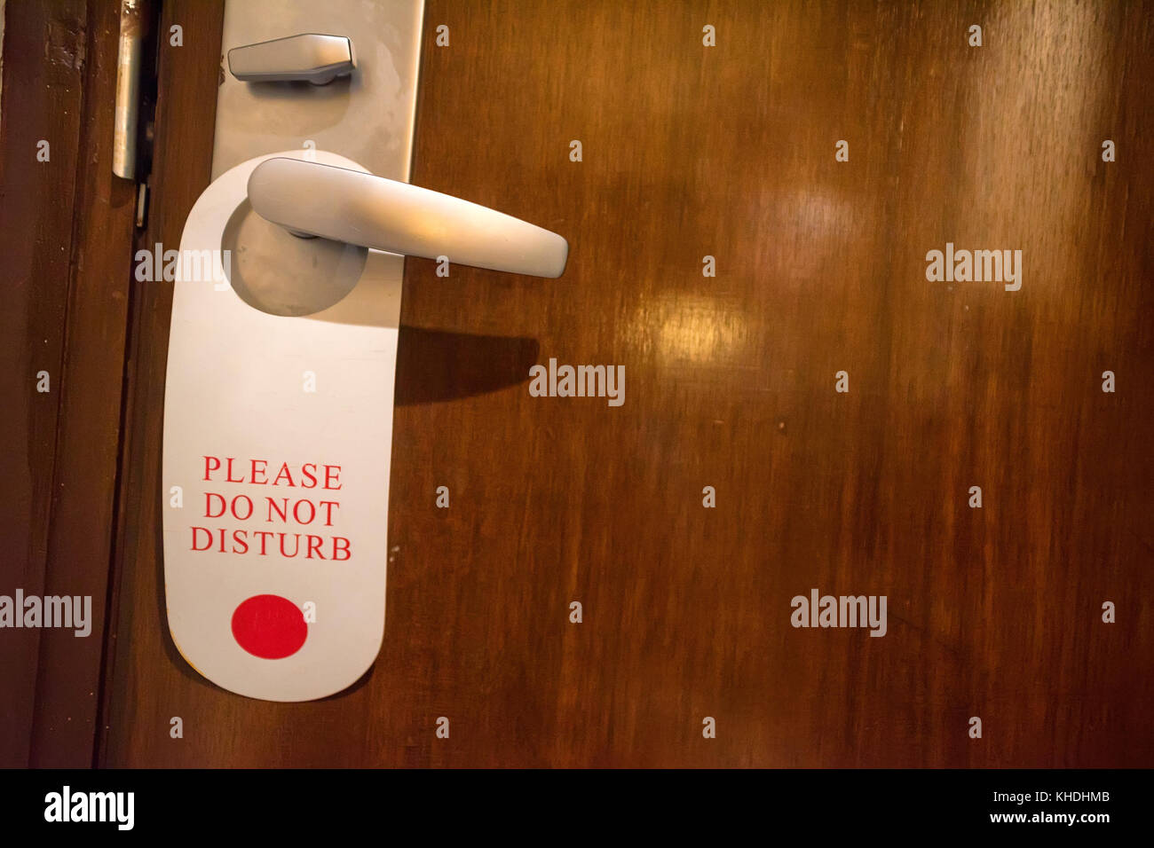Do not disturb sign on doorknob Stock Photo - Alamy