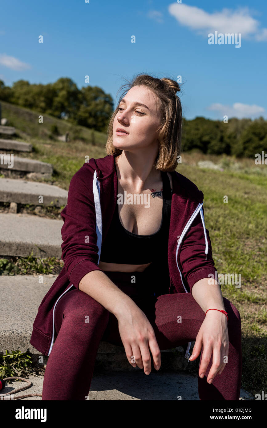 woman relaxing after workout Stock Photo