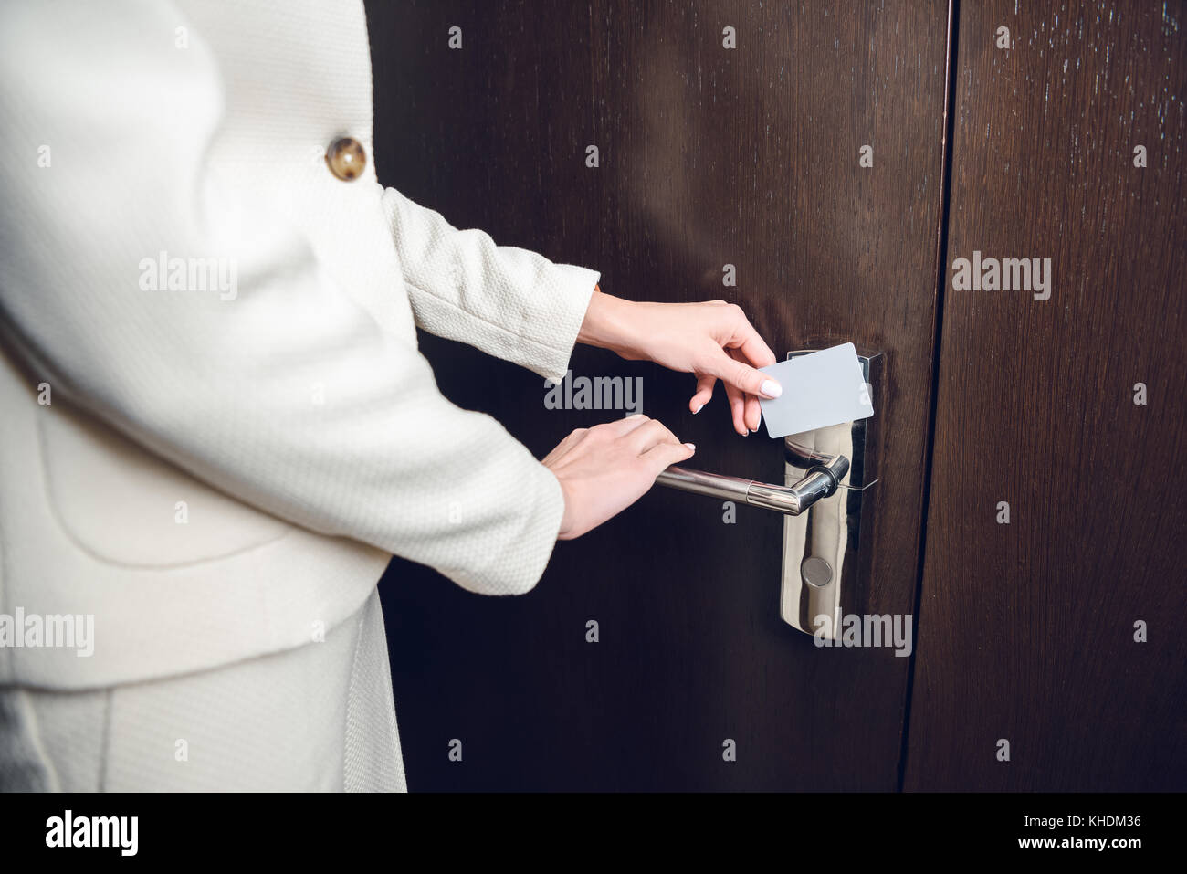 businesswoman opening hotel room door Stock Photo Alamy