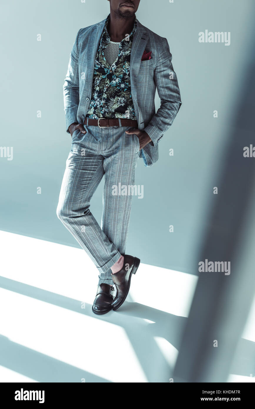 Stylish african american man with hands in pockets Stock Photo - Alamy