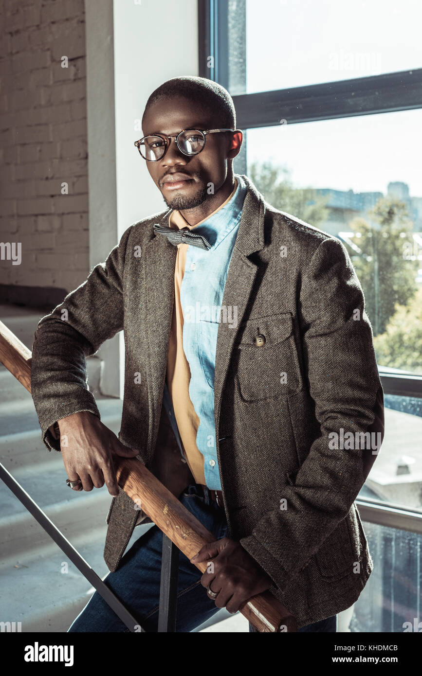 Stylish african american man on stairs Stock Photo - Alamy