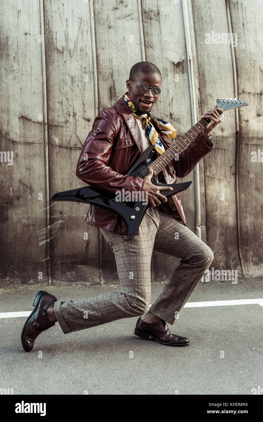 african american man posing with guitar Stock Photo - Alamy