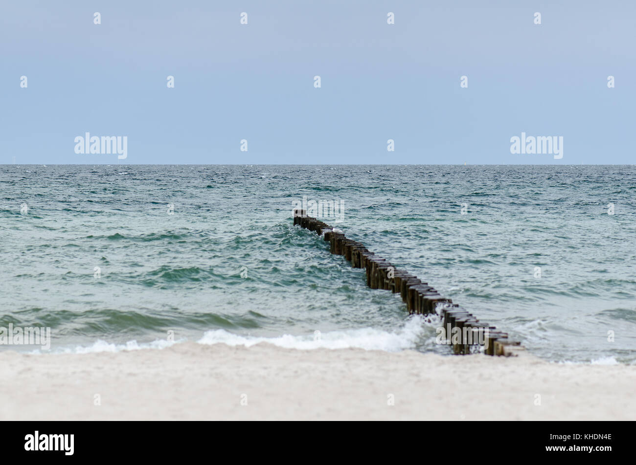 groynes in the baltic sea, blue sky Stock Photo