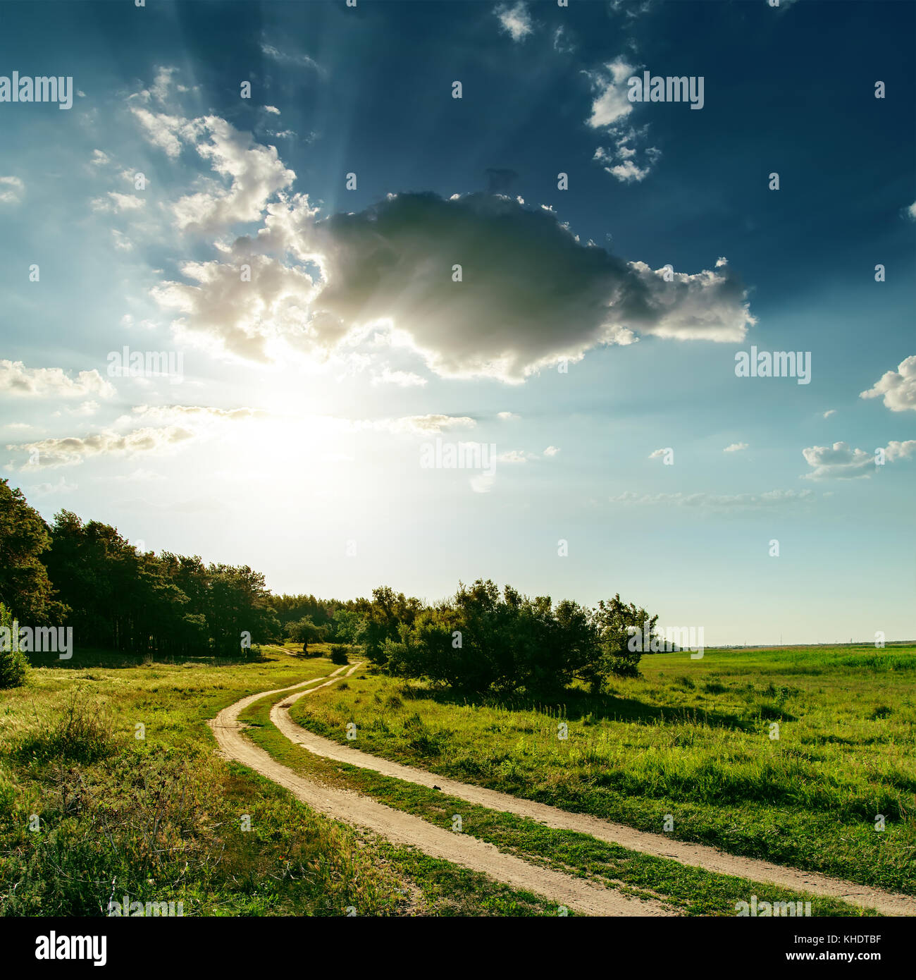 dirty road and sunset over it Stock Photo - Alamy