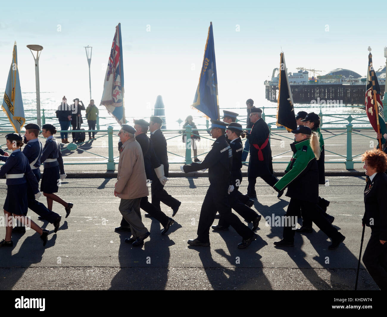 Cadets and ex-servicemen march along the Brighton seafront on Remembrance Day Stock Photo