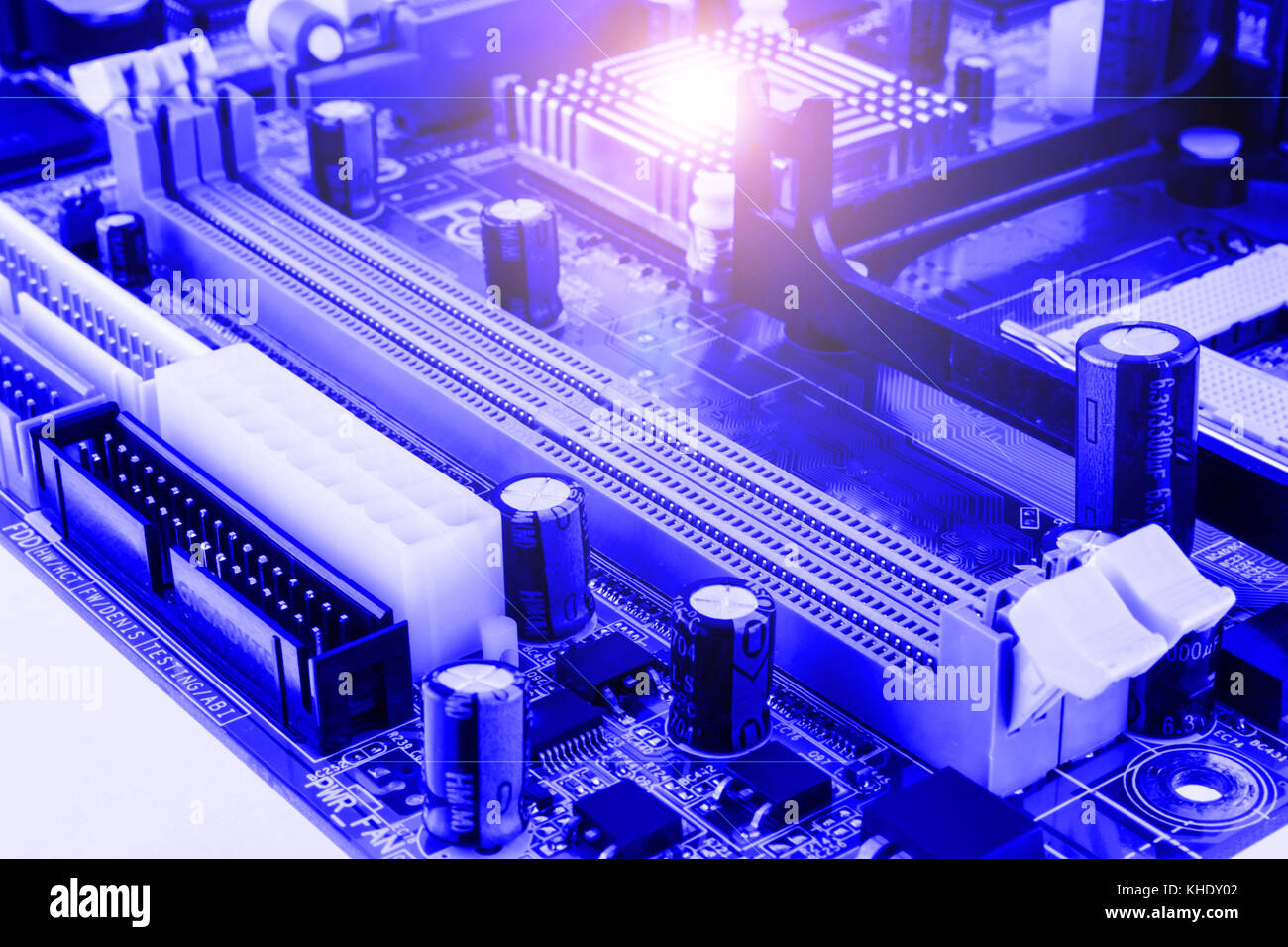 Resistors, capacitors and other electronic components of micro chip inside the computer close up