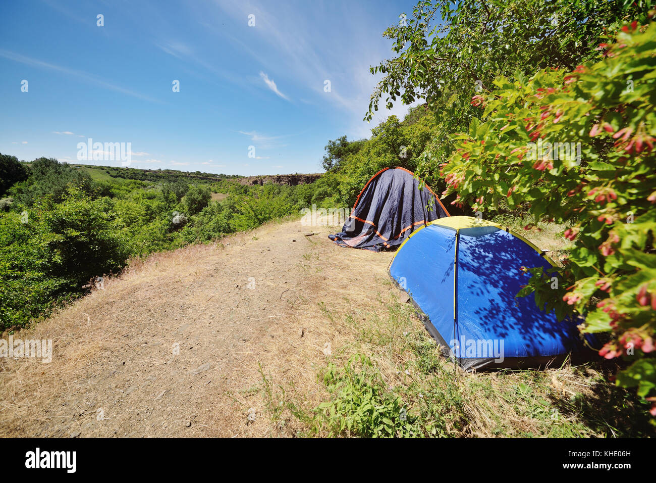 Two tourist tents in the background of beautiful scenery and greenery ...