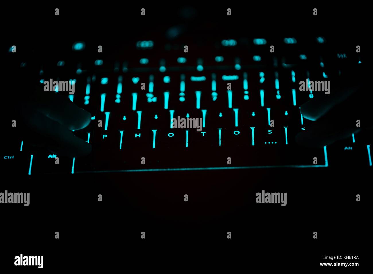 Photos - text on illuminated computer keyboard at night. Internet ...