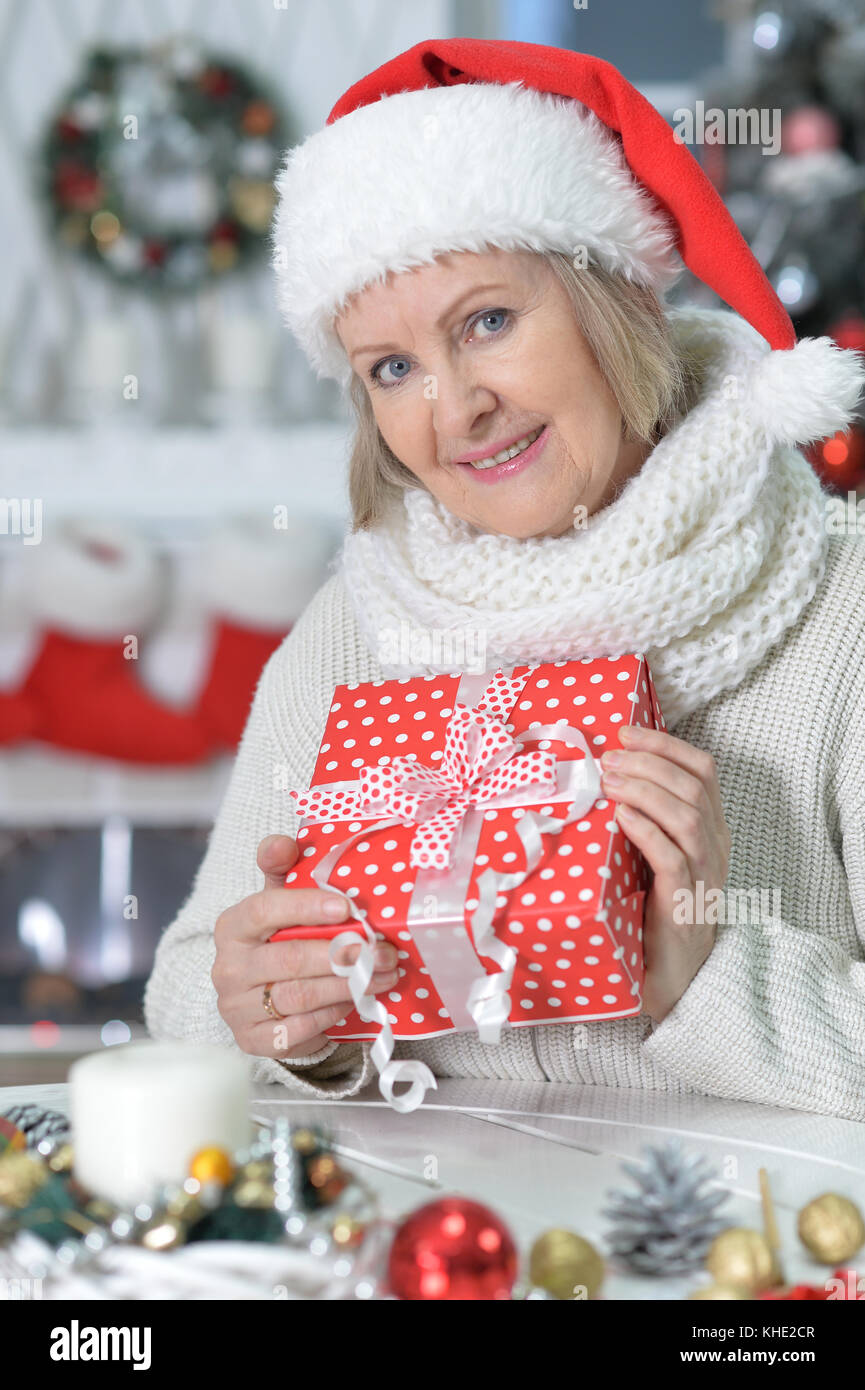 Mature woman purchasing christmas hi-res stock photography and images ...