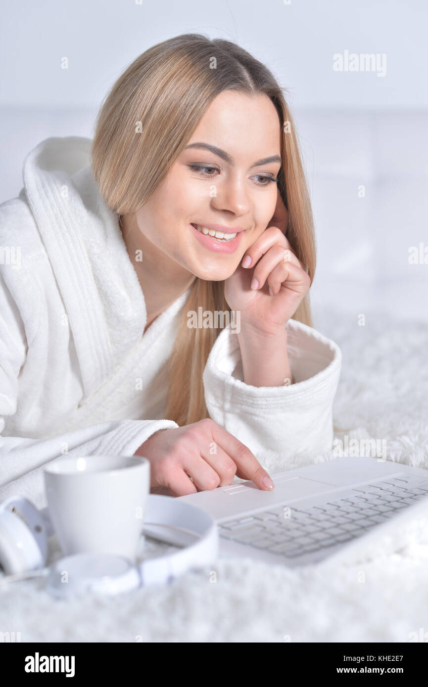 young woman using laptop Stock Photo - Alamy