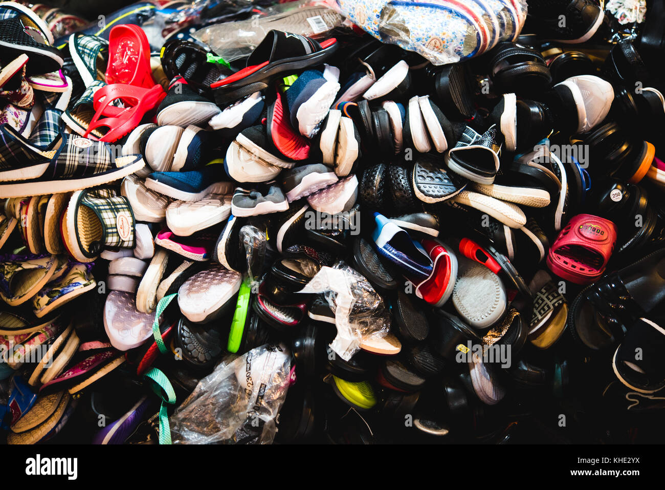 A pile of shoes being sold at Kwangjang Market, Seoul 2017. Stock Photo