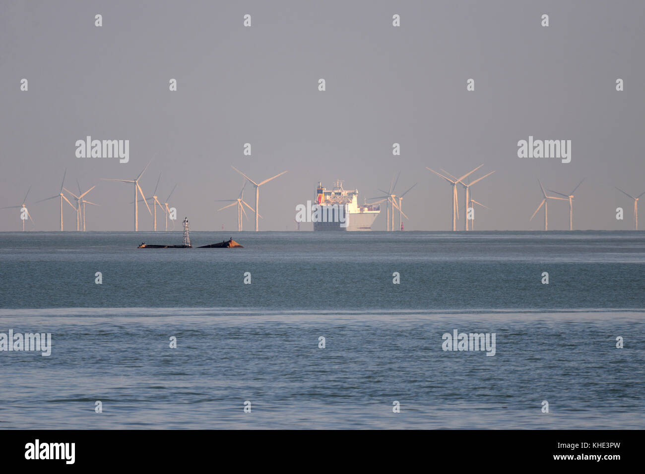 Ship navigating through Kentish Flats Offshore Wind Farm with Mulberry