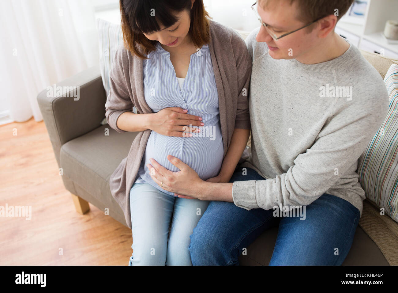 close up of man and pregnant woman Stock Photo - Alamy
