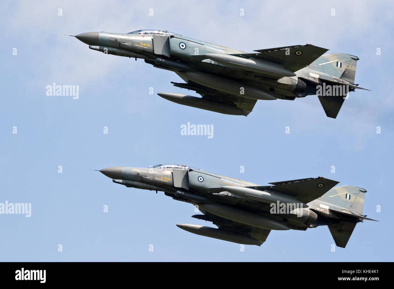 FLORENNES, BELGIUM - JUN 15, 2017: Two Greek Air Force F-4 Phantom fighter jet planes in formation flight. Stock Photo