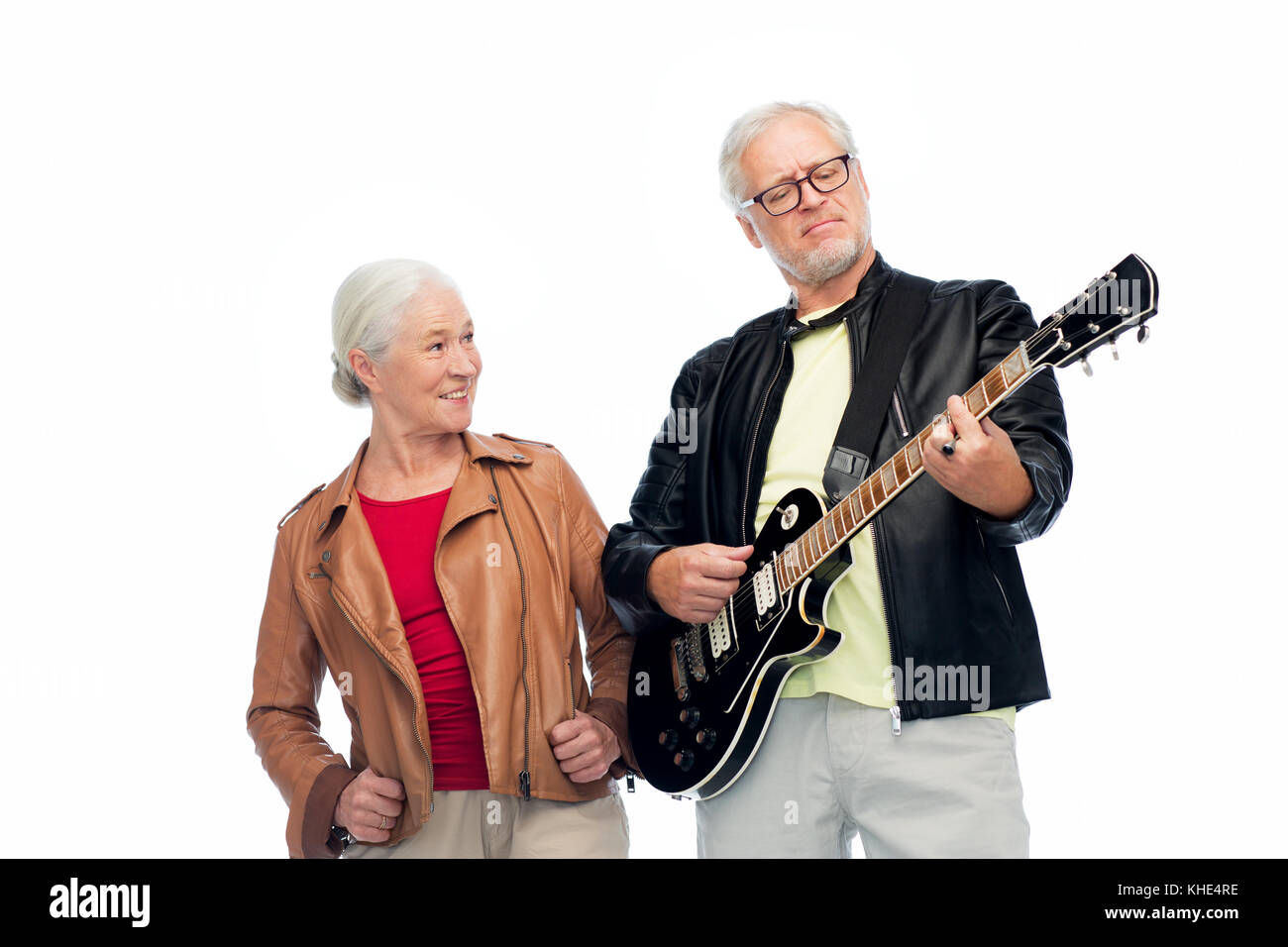 happy senior couple with electric guitar Stock Photo