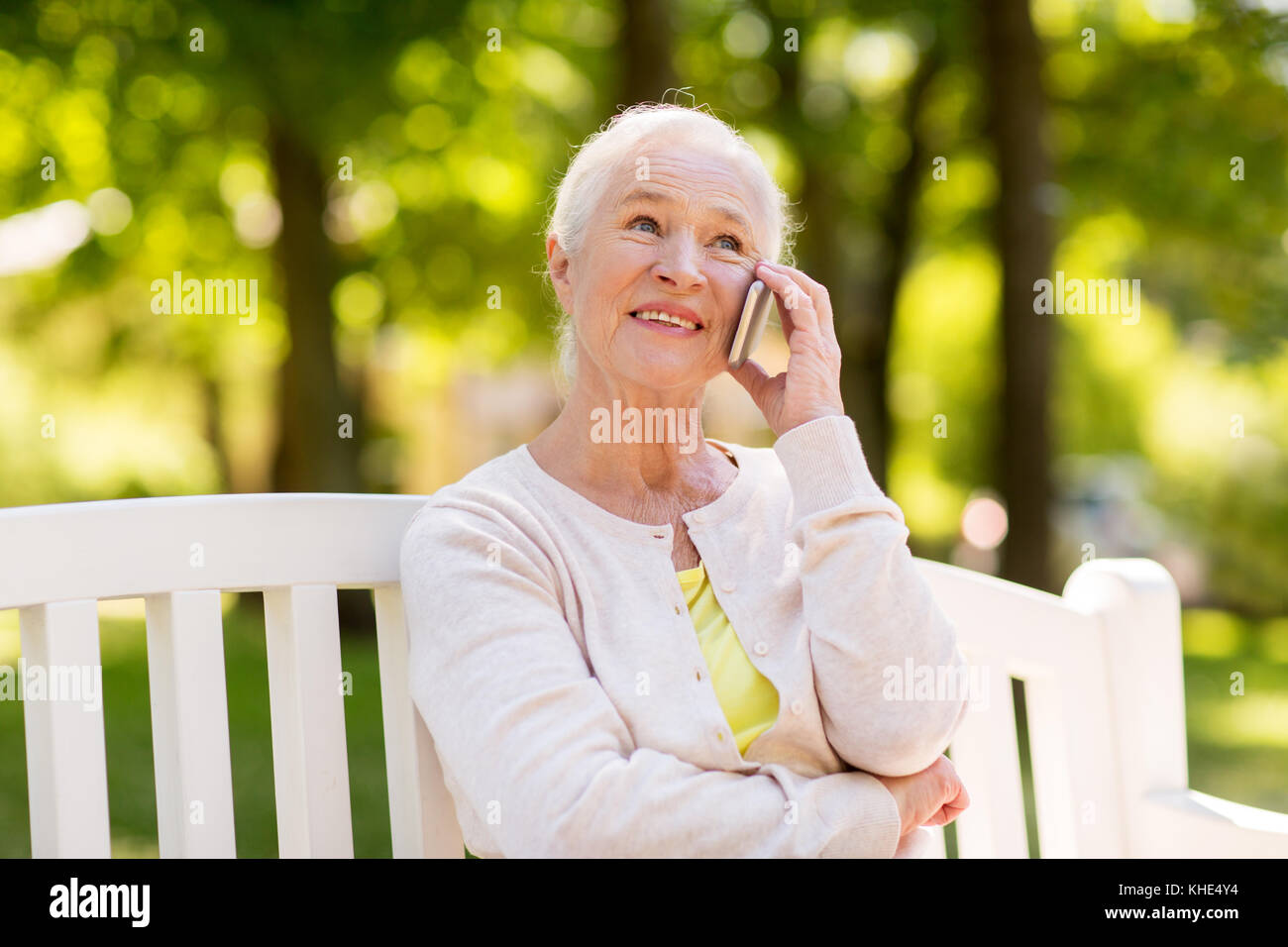 Happy mature woman calling hi-res stock photography and images - Alamy