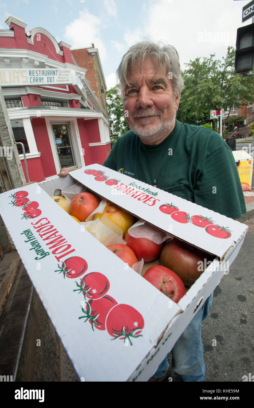 Tuscarora Organic Growers (TOG) drivers Ray Smith (with cap) and James