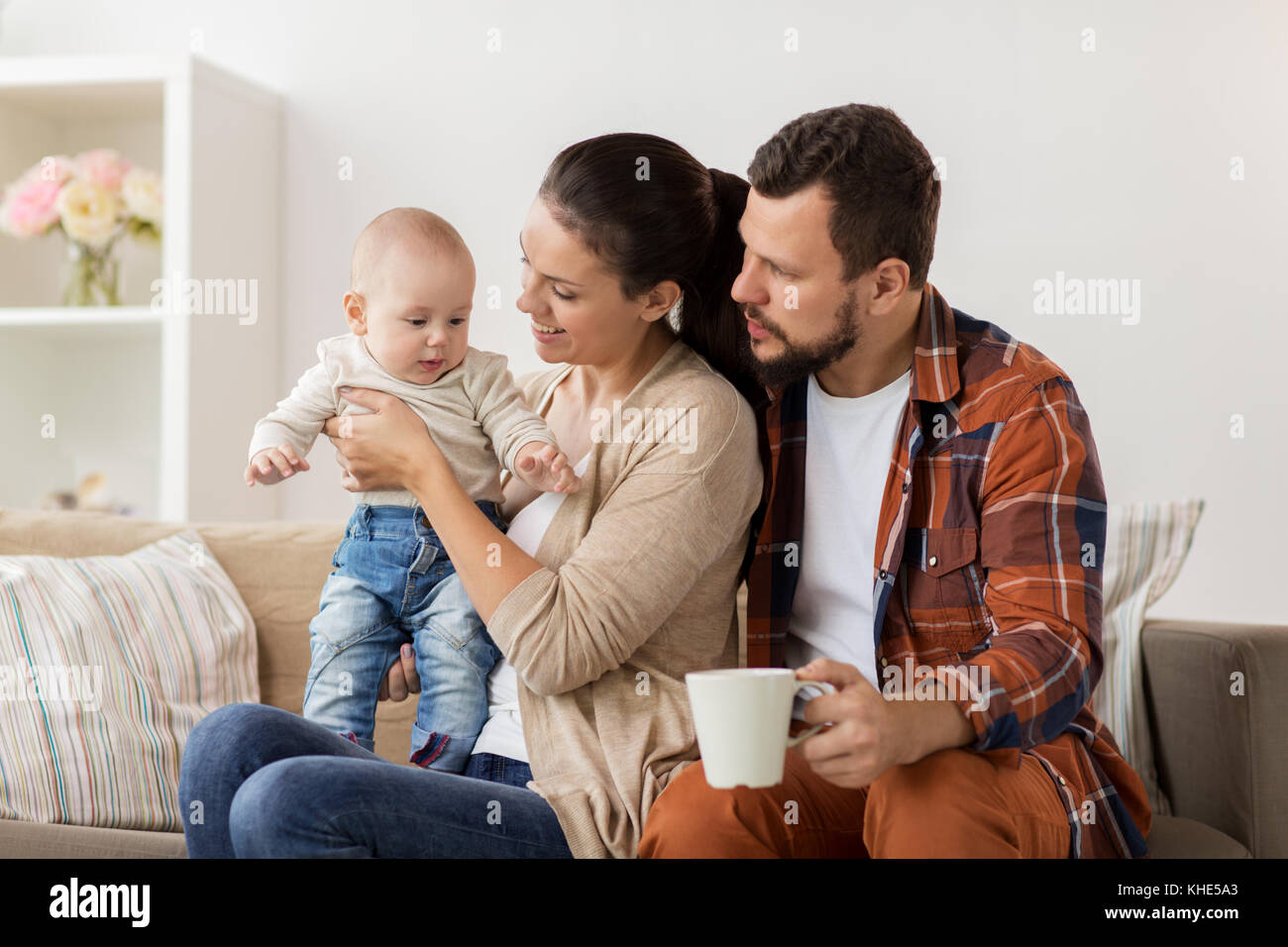 happy family with baby at home Stock Photo Alamy