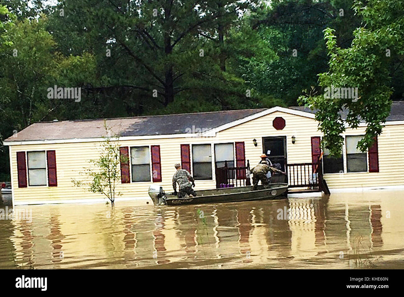 Soldiers conduct evacuations by boat during severe flooding in Tangipahoa Parish, Tickfaw, LA on